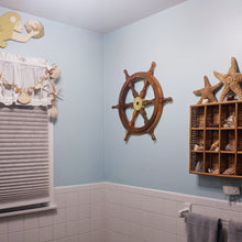 Load image into Gallery viewer, 24 Inch Wooden Ship Wheel Wall Decoration with Brass Center Hub, Turned Spokes and Handles, Maritime Nautical Boat Helm Decor, Brown Wood