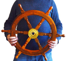 Load image into Gallery viewer, 24 Inch Wooden Ship Wheel Wall Decoration with Brass Center Hub, Turned Spokes and Handles, Maritime Nautical Boat Helm Decor, Brown Wood