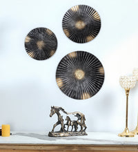 Load image into Gallery viewer, Hanging Black & Gold Ribbed Metal Circles Wall Decoration - Set of 3 Different Sizes: 12", 15", and 18" Diameter