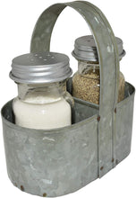 Load image into Gallery viewer, 3 piece set includes Salt shaker, Pepper shaker, and Caddy with handle | Perfect for indoor or outdoor dining, this vintage style spice shaker set is made with sturdy galvanized steel that is resistant to rust caused by water or air moisture | Offers a vintage flair that looks great with rustic, old country, mid-century, and farmhouse themed kitchens and restaurants | Each shaker holds 1/4 cup of salt, pepper, or spice and features an easy-to-fill wide mouth with screw-on lid | Compact and porta