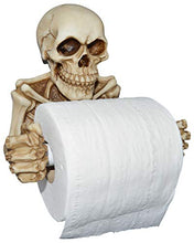 Load image into Gallery viewer, Whether you are planning a Halloween party or enjoy spooky decorations year-round, you will fall in love with this skeleton toilet paper holder! | Made of sturdy detailed painted resin that is eye catching and it fits great with all Gothic, horror, scary, and ghoulish themes | Easy installation — features a keyhole slot for mounting to your bathroom wall using the included mounting screw and anchor | The spring loaded holder fits between the skeleton's hands and can be removed and reinserted whe