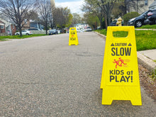 Load image into Gallery viewer, Caution! SLOW - KIDS at PLAY! Sign, Double Sided, High Visibility Yellow Color, Fold-Out with Handle