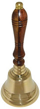 Load image into Gallery viewer, Solid polished brass bell with comfortable wooden handle | Measures 8.5 inches tall and 3.75 inches wide — it is the perfect size bell to keep on a desk | Despite it's antique look, it is a fully functional bell with an impressive ringing sound that can be heard from a long distance away! | Features a vintage design that is reminiscent of the handbells that school teachers used to ring to let students know to return to school after their mid-day break | Perfect to use as a dinner bell, school be