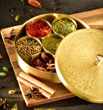 Load image into Gallery viewer, Medium Size Brass (Gold Color, Floral Pattern) Round Masala Dabba Box with 7 Containers and Mini Spoon, Measures 8-inches Wide x 1⅞-inches Tall
