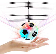 Load image into Gallery viewer, ? This fun flying ball senses objects below or nearby and it will move away intelligently. As the ball slowly descends, place your hand underneath and watch it fly upward like magic! | ?? Enjoy indoors or outdoors any time of day as the ball has LED lights that sparkle and shine that make it easy to see at night! | ?? Easy to use — simply turn on the power switch located on the bottom and then hold the ball upright. After 2 or 3 seconds, the propellers will begin to spin and you can now release 
