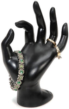 Load image into Gallery viewer, Holds rings, bracelets, and necklaces | Elegant hand form shape | Black polyresin material | Measures 6.5-inch height, 4.7-inch width, 3.5-inch depth | Perfect for business use to showcase products or home use to store and organize jewelry
