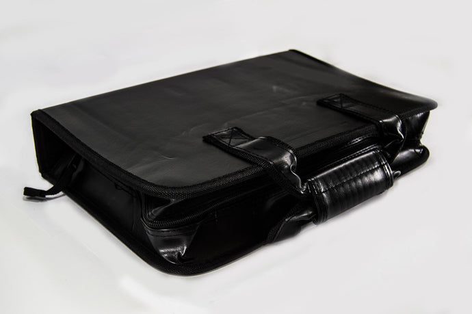 Vinyl technician's zippered tool case with 27 elastic holders of varying sizes. | Holds screwdrivers, soldering iron, meter, parts box, hand tools and more | Dimensions: 22