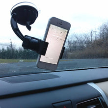 Load image into Gallery viewer, Convenient suction mounted phone holder with 360 degree adjustability — mount your phone just the way you need for easy viewing | Features suction cup with latch that locks to any smooth or lightly textured surface, allowing placement almost anywhere in your vehicle including windshield and dashboard | High temperature ratings to withstand even the hottest of summers | Quick and easy to mount and unmount your phone — simply squeeze the clips in the back to open the clamp handles and insert or re
