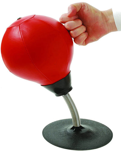 Having a bad day? Get stress relief for the home or office with this tabletop punching bag! | Features a heavy duty spring that bounces the punching ball right back for more punishment | Strong suction cup base keeps the punching ball anchored in place while you punch away | Durable to withstand any amount of executive venting | Quick and easy to set up and an air pump is included (NOTE: pin for pump is stored in the stem of the plunger)
