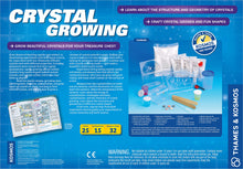 Load image into Gallery viewer, Thames &amp; Kosmos Crystal Growing Science Kit Grow Over A Dozen Crystals with 15 Experiments, Includes Storage Case &amp; 32 Page Color Laboratory Manual
