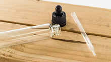 Load image into Gallery viewer, 10 Pack 1 Ounce (30mL) Clear Round Glass Dropper Bottles with Black Tops
