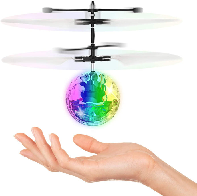 ? This fun flying disco ball senses objects below or nearby and it will move away intelligently. As the ball slowly descends, place your hand underneath and watch it fly upward like magic! | ?? Enjoy indoors or outdoors any time of day as the ball has LED lights that sparkle and shine that make it easy to see at night! | ?? Easy to use — simply turn on the power switch located on the bottom and then hold the ball upright. After 2 or 3 seconds, the propellers will begin to spin and you can now re